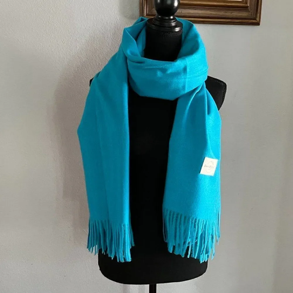 Blue Soft warm scarf is a mixture of acrylic and cashmere
